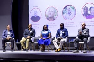 Caption : Panel discussion featuring Africa Online Safety Fund beneficiaries, Craig Rosewarne (Wolfpack Information Risk), Camaren Peter (Centre for Analytics and Behavioural Change), Martha Sunda (Childline Kenya), Dennis Ratemo (Terre des Hommes Netherlands), and panel moderator, Tanner Methvin (Impact Amplifier), at the African Online Safety Platform launch in Johannesburg.